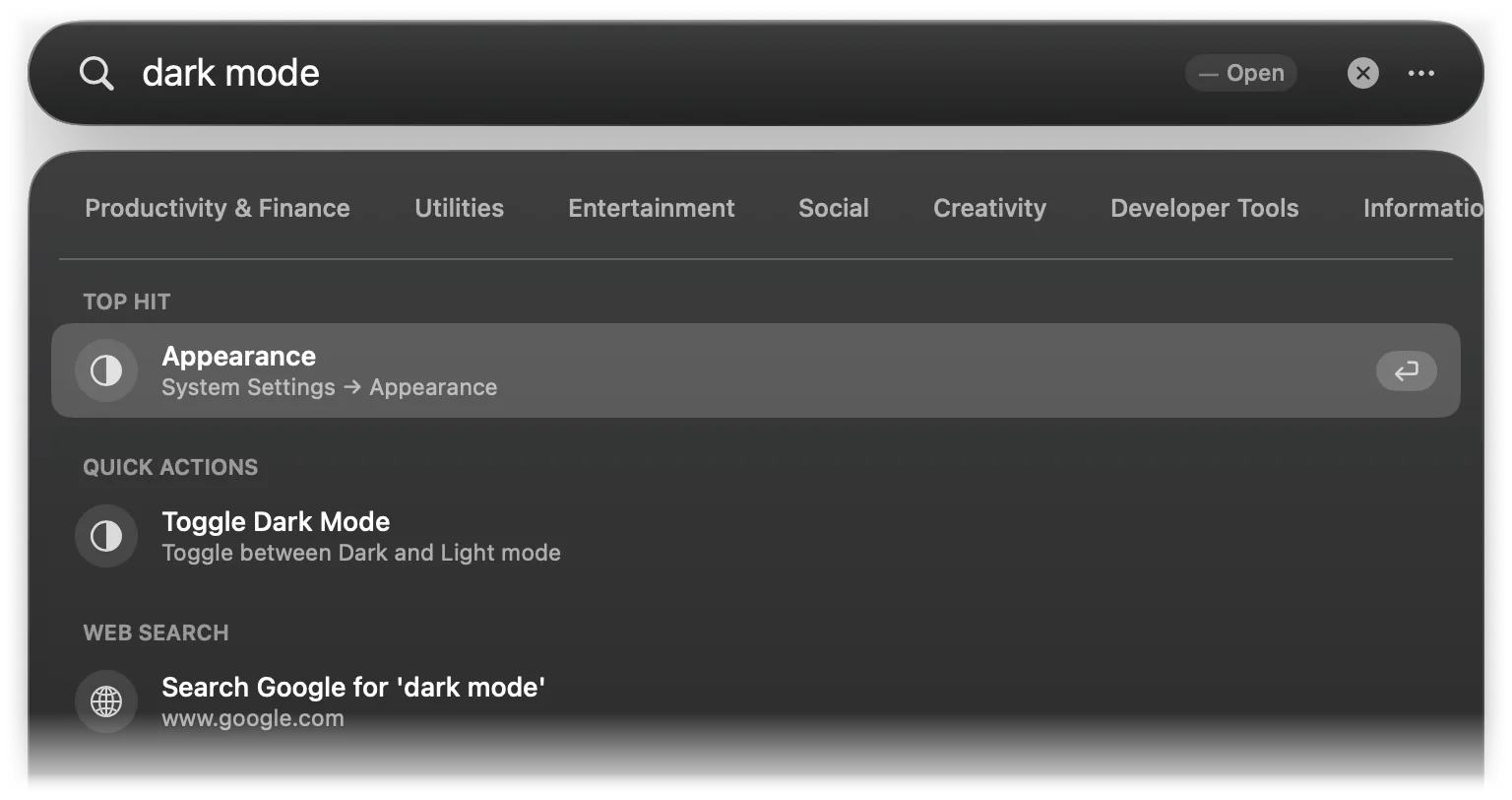 Typing dark mode: the Appearance pane as Top Hit and Toggle Dark Mode under Quick Actions